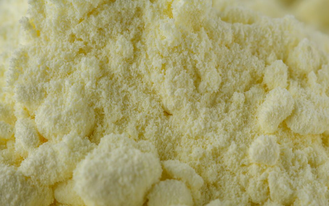 purified sulfur powder on a white acrylic background